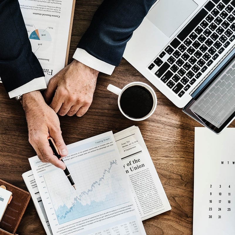 Professional business meeting with coffee and documents